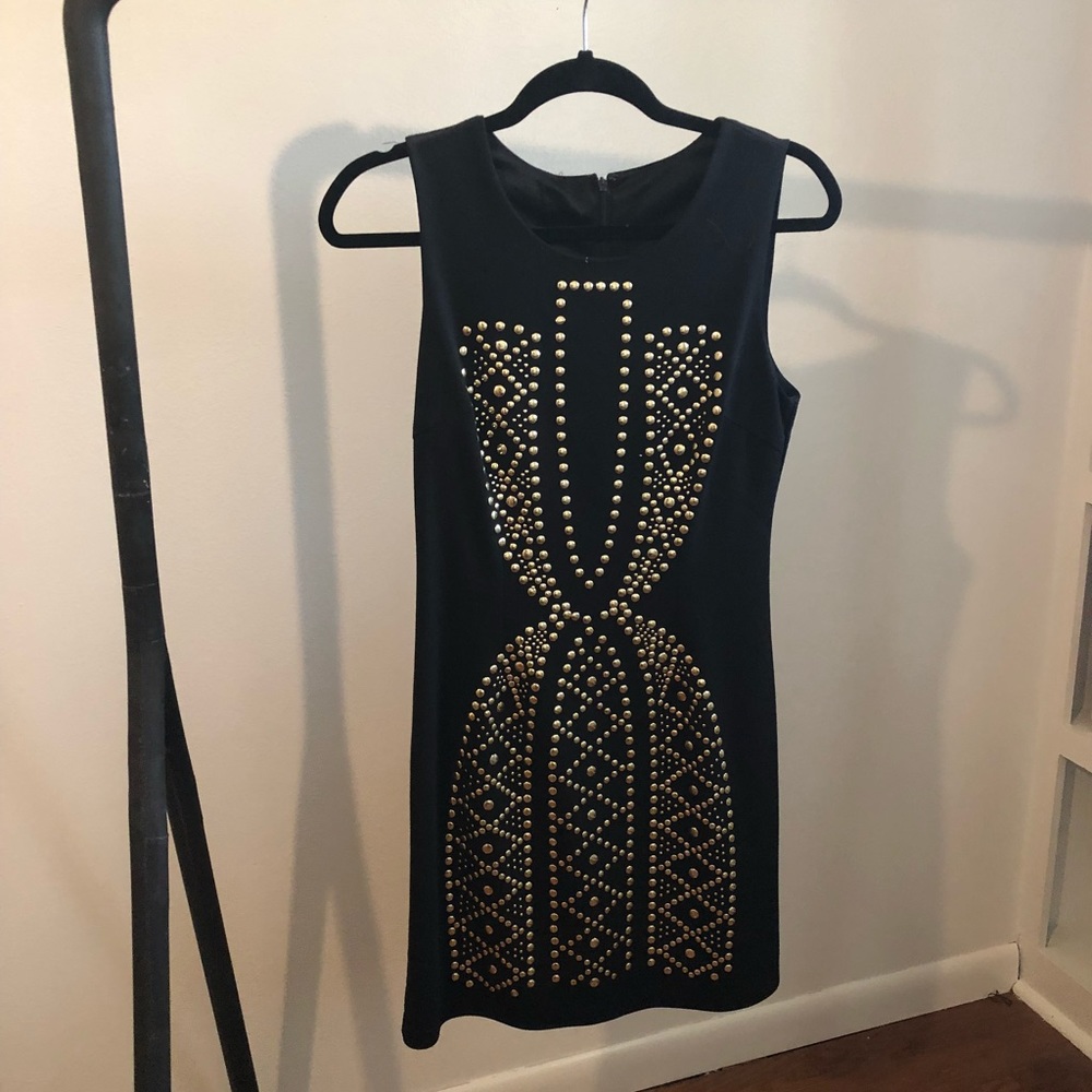 Black dress with gold stud accent